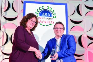 Jeff Chapman (Sciex) accepts the 2016 analytical technology award from BPI’s Anne Montgomery.