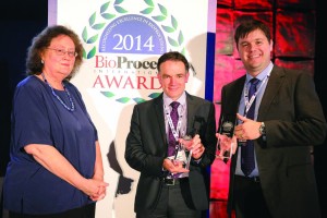 Richard Wales and Christopher Kistler accepting for TAP Biosystems (now part of Sartorius Stedim Biotech) and Merck