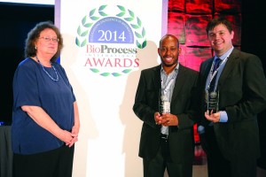 Mwai Ngibuini and Christopher Kistler accepting for TAP Biosystems (now part of Sartorius Stedim Biotech) and Merck 